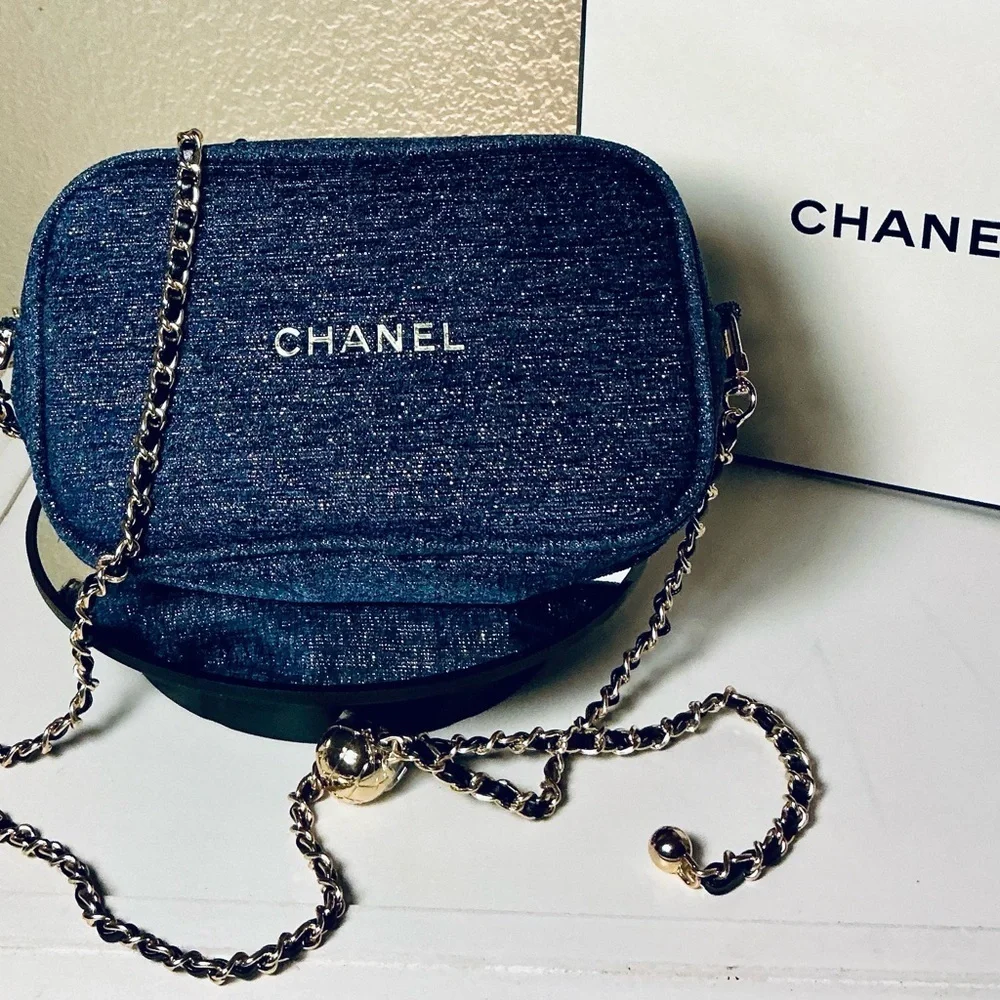 CHANEL Denim Blue Sparkle Pouch with Gold Accents